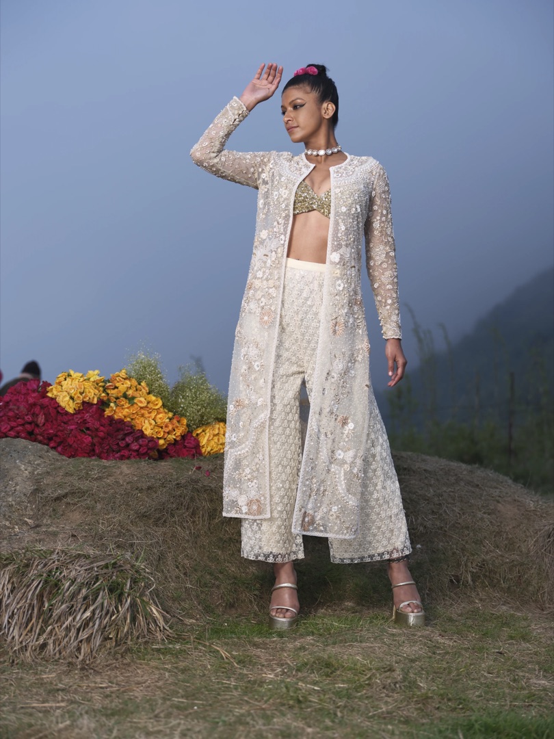 Ivory hand-embroidered couture high on a Himalayan hillside